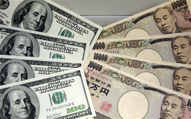 انتعاش الدولار يطيح بالين الياباني إلى أدنى مستوى له